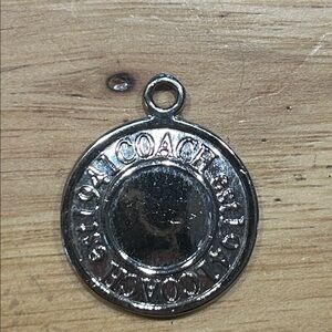 Coach Round Silver Logo Charm